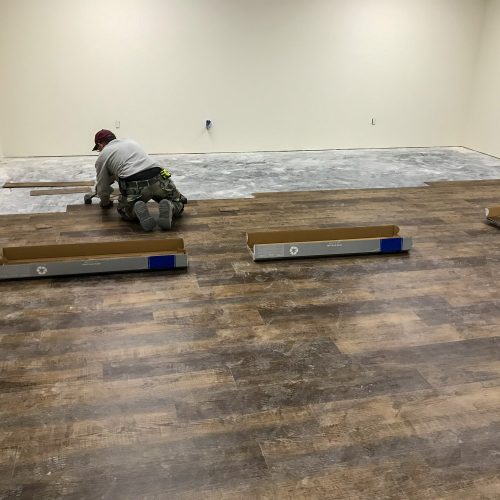 Putting down laminate flooring